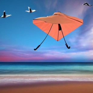 Umbrella on the beach with toys scattered. (https://freeimagegenerator.com/)